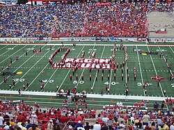 A view of the Pride of Acadiana marching band playing the fight song in the Louisiana Ragin Cajuns set during pregame at Cajun Field. UL set.JPG