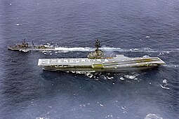 USS Kearsarge (CVS-33) crew spells out 'Mercury 9' on the flight deck, 15 May 1963 (GPN-2000-001403).jpg