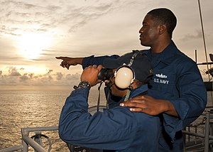 US Navy 120124-N-FI736-001 Sailors scan the horizon for surface contacts while on watch aboard the aircraft carrier USS Enterprise (CVN 65).jpg