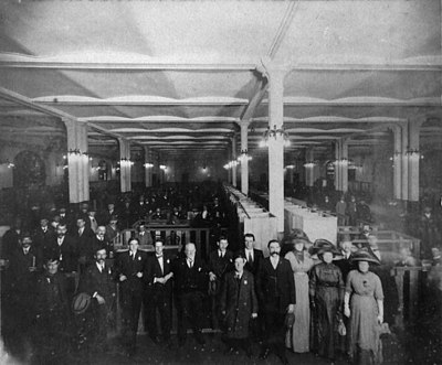 Men and women voters and polling booths, 1910. Voting at Town Hall.jpg