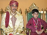 a punjabi Dulha with Shahbala in wedding dress