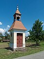 English: Bell tower in the village of Ústrašice, Tábor District, Czech Republic. Čeština: Zvonička nedaleko č.p. 29 v obci Ústrašice v okrese Tábor.