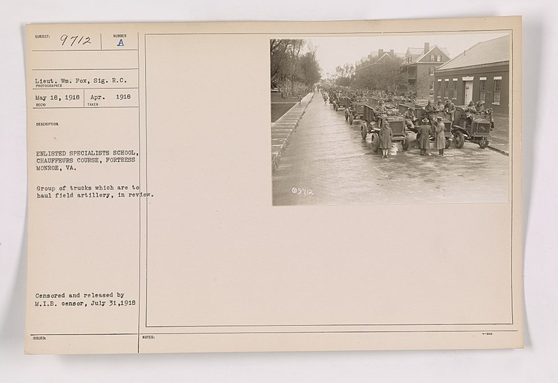 File:111-SC-9712 - Enlisted specialists school, chauffeurs course, Fortress Monroe, Va. Group of trucks which are to haul field artillery, in review. - NARA - 55179755.jpg