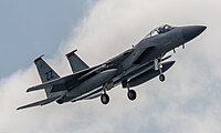 A US Air Force F-15C Eagle, tail number 80-0012, on final approach at Kadena Air Base in Okinawa, Japan