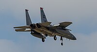 A US Air Force F-15C Eagle, tail number 83-0011, on final approach at Kadena Air Base in Okinawa, Japan. The aircraft is assigned to the 67th Fighter Squadron.