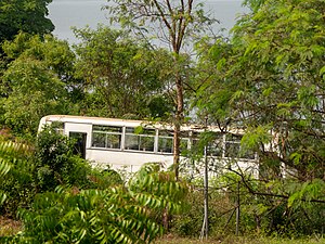 Abandoned bus at the bank of the Volta river in Atimpoku