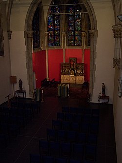 The Immaculate Conception Chapel of the American College, in which O sodales has been sung countless times. The neogothic chapel dates from 1891, nearly 30 years after the composition of hymn. American College Chapel.jpg