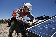 Solar installation, Natural Bridges At work on the solar array. (9472037155).jpg