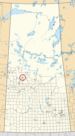 Saskatchewan vilayetinin 297 kırsal belediyesini ve yüzlerce küçük Kızılderili rezervini gösteren bir haritası. Biri kırmızı bir daire ile vurgulanmıştır.