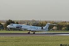 CRJ-900 Nordica à l'atterrissage à l'aéroport de Bruxelles-National.