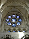1180 Verglasung der Nordrose, aus 9 gelappten und 8 kleinen Rundfenstern
