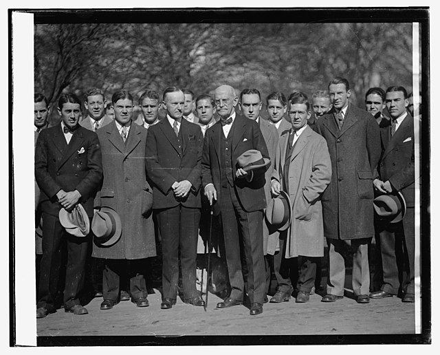 Members of the Centre College football team meeting with President Calvin Coolidge and Senator Richard P. Ernst in 1921.