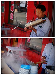 Cutting thin strips of dough from a loaf directly into a container of boiling water to make knife-cut noodles in Datong, Shanxi