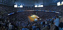 The Dean Smith Center is home of North Carolina Tar Heels men's basketball. Dean E. Smith Center (Florida State vs. North Carolina - February 23, 2019).jpg