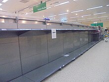 The effects of panic buying in a Morrisons supermarket in Wetherby, West Yorkshire Depleted lavatory rolls during the 2020 Coronavirus outbreak, Morrisons, Wetherby (20th March 2020).jpg