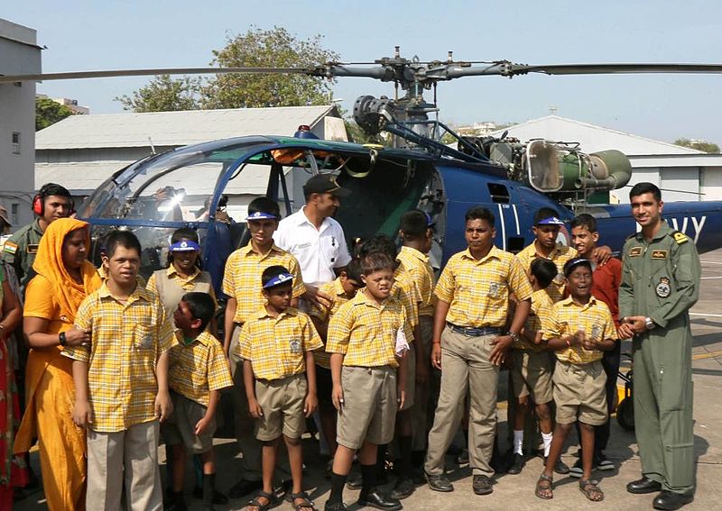 File:Differently abled and special children get close to an Indian Navy helicopter at INS Shikra.jpg