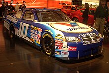 The Car of Tomorrow model on display in January 2008. Drivers and fans alike criticized the aesthetics of the car, and some have cited the Car of Tomorrow for contributing to the decline of NASCAR. Dodge Charger NASCAR (Montreal).jpg