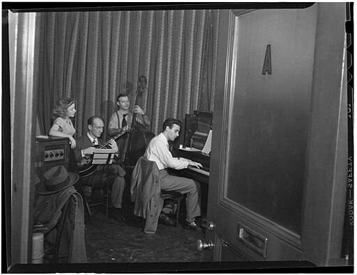 Donn Trenner with Helen Carr, Sammy Herman, Joe Bianco, Nola's, New York, N.Y., ca. Feb. 1947 (William P. Gottlieb 14521)