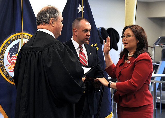 Duckworth being sworn in as Assistant Secretary of Public and Intergovernmental Affairs for the United States Department of Veterans Affairs, by Judge