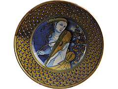 Woman with a viol dish, earthenware and metal lustre, Deruta (Italy), 16th century (on loan from the Louvre)