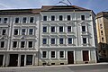 Apartment building, of the type in closed development, with shop with original front, corner house on Hohe Straße