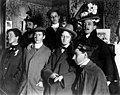 Group portrait with men wearing women's hats, July 16, 1898 (WASTATE 2522).jpeg
