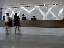 Check-in counter at a hotel in Hong Kong HK Shek Tong Tsui Xiang Gang Sheng Mao Fan Dian Traders Hotel Hong Kong Check-In service counter Aug-2010.JPG