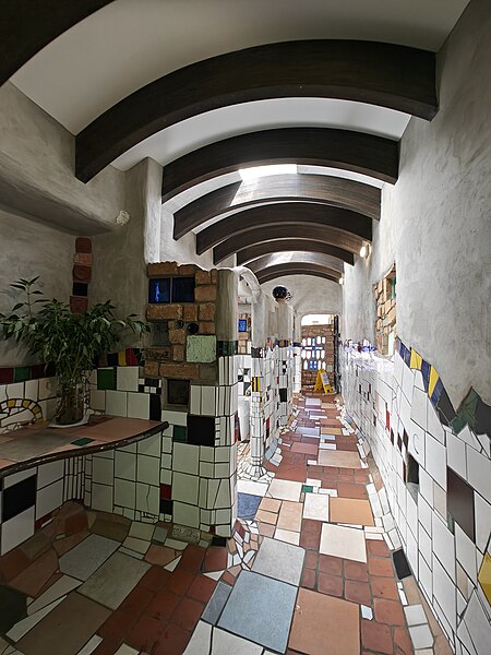 File:Hundertwasser Toilets - Women's Hallway Towards Door - 2023.jpg