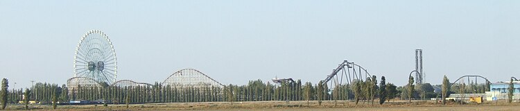 The Katun inverted rollercoaster with the 92 m tall Eurowheel in the background ITALY-ROLLERCOASTERS-SKYLINE MIRABILANDIA-.JPG