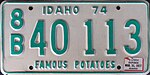 Наклейка номерного знака штата Айдахо 1977 года на номерном знаке 1974 года.jpg