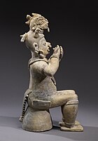 Figure of the Jama Coaque culture (300 BCE-800 CE) (from Manabi Province). Walters Art Museum. Jama-Coaque - Figure Seated on a Bench with Hands Held to Mouth - Walters 482862 - Right Side.jpg