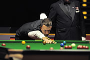 Deutsch: Bild aufgenommen in Berlin während des German Masters im Snooker 2014. Judd Trump. English: Picture taken in Berlin during the Snooker German Masters in 2014. Judd Trump.