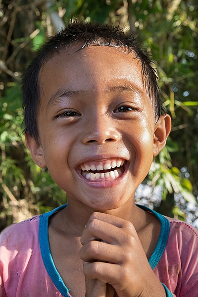 File:Laughing boy in sunshine.jpg