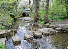 A stepping stone crossing over Leadmill Beck (also known as Risedale Beck further upstream) in Catterick Garrison