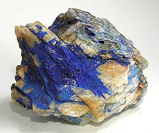 Linarite is a somewhat rare, crystalline mineral that is known among mineral collectors for its unusually intense, pure blue color. It is formed by the oxidation of galena and chalcopyrite and other copper sulfides. It is a combined copper lead sulfate hydroxide with formula PbCuSO4(OH)2. 
Linarite occurs as monoclinic prismatic to tabular crystals and irregular masses. It is easily confused with azurite, but does not react with dilute hydrochloric acid as azurite does. It has a Mohs hardness of 2.5 and a specific gravity of 5.3 - 5.5.