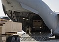 Two U.S. Army M142 High Mobility Artillery Rocket Systems assigned to the 1st Battalion, 14th Field Artillery Regiment are being loaded into a U.S. Air Force C-17 Globemaster III assigned to the 816th Expeditionary Airlift Squadron as part of joint training at Ali Al Salem Air Base, Kuwait, Jan. 27, 2021. The C-17 is capable of rapid strategic delivery of troops and all types of cargo to main operating bases or directly to forward bases in a deployed location. (U.S. Air Force photo by Senior Airman Kristine Legate)