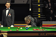 Deutsch: Bild aufgenommen in Berlin während des German Masters im Snooker 2014. Marcel Eckardt und Ryan Day. English: Picture taken in Berlin during the Snooker German Masters in 2014. Marcel Eckardt and Ryan Day.