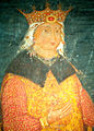 A corpulent woman wearing a crown