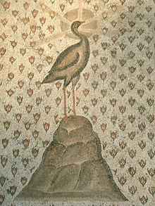 5th-century mosaic of a nimbate phoenix from Daphne, Antioch, in Roman Syria (Louvre) Mosaique Phenix 01.JPG