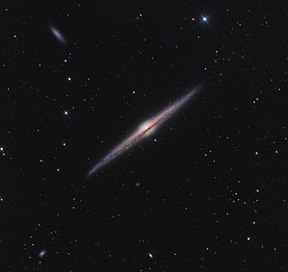 NGC 4565 Edge-on spiral galaxy in the constellation Coma Berenices