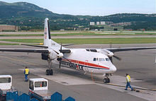 A former Norwegian Fokker 50, phased out in 2004 Norwegian Air Shuttle F50 at Trondheim.jpg