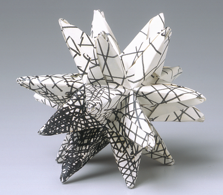 A stellated icosahedron made from custom papers