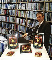 Osy presenting one of his most important works at the Book Fair of Buenos Aires.
