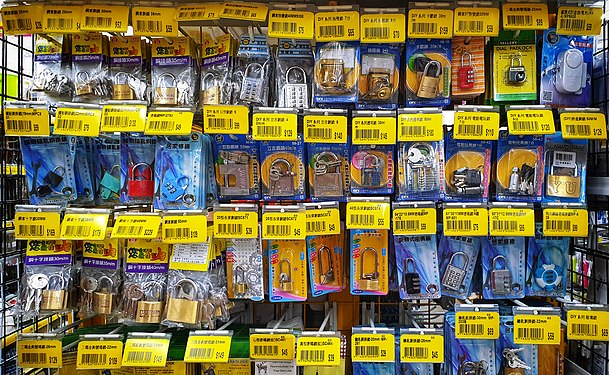 Padlocks with keys in a hardware store