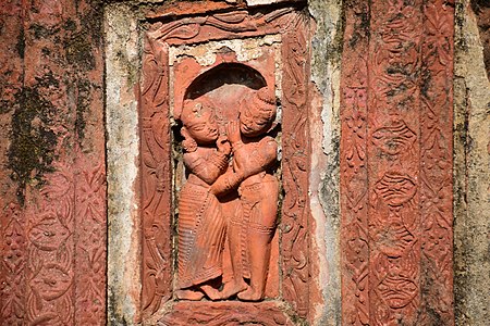 Terracotta relief of a temple at Kadasol depicting Krishna and Radha.