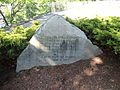 Detail of a memorial to Passaconnaway, a Native American leader of the Pennacook tribe (also known as the Merrimack or Pawtucket). The memorial reads: MEMORIAL TO PASSACONNAWAY CHIEF OF PAWTUCKET INDIANS NEAR THIS SPOT IN 1648 HE ACCEPTED CHRISTIANITY UNDER THE PREACHING OF JOHN ELIOT PRESENTED BY MOLLY VARNUM CHAPTER D A R GIVEN TO THE CITY OF LOWELL JUNE 11, 1935