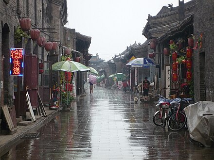One of the main streets of Pingyao after a rain shower.