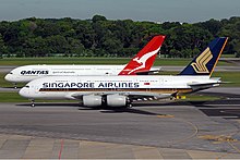 Qantas and Singapore Airlines A380s Qantas and Singapore Airlines Airbus A380 at Changi Airport Prasertwit.jpg
