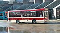 English: Safeguard Coaches H577 MOC, a Dennis Dart/Carlyle Dartline, in Guildford Friary bus station, Guildford, Surrey, on route 4. The front of the bus has been rebuilt from the original Carlyle body to a Plaxton Pointer one. This, the most elderly vehicle in Safeguard's fleet, was retained to act as a spare for the Guildford Shuttle, on which a tight turn dictates the use of short buses.