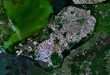 The Flevopolder in the Netherlands, reclaimed from the IJsselmeer, is the largest reclaimed artificial island in the world. Satellite image of Flevopolder, Netherlands (5.48E 52.43N).png